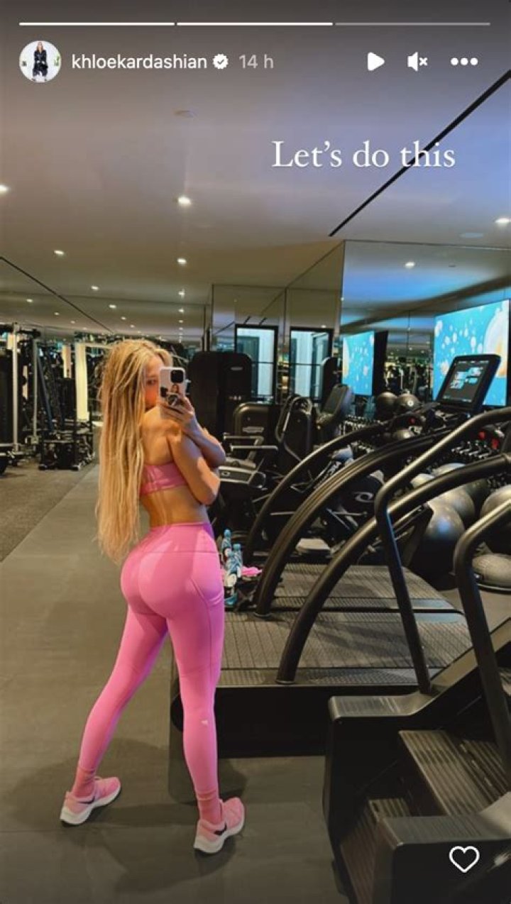 Khloe Kardashian Shows Off Her Toned Figure In Neon Pink Crop Top & Leggings For Workout