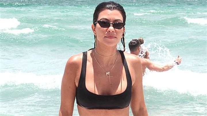 Kourtney Kardashian, 42, Sizzles In Floral Bikini As She Spends MDW With Travis Barker & Her Kids