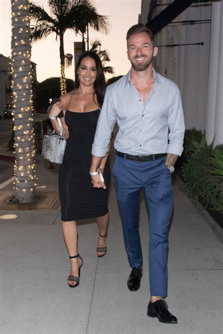 Nikki Bella & Fiancé Artem Chigvintsev ‘Closer Than Ever’ After Birth Of Their Son