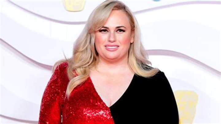 Rebel Wilson Plays Football In Lace Mini-Dress On The NFL Honors Field — Watch