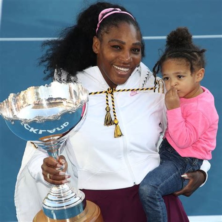 Serena Williams’ Daughter, 3, Looks Adorable In Blue Dress While Intently Watching Mom Play Tennis — Pics