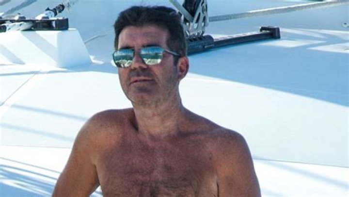 Simon Cowell, 60, Shows Off 20 Lb. Weight Loss While Shirtless & Kissing GF Lauren Silverman — Pics